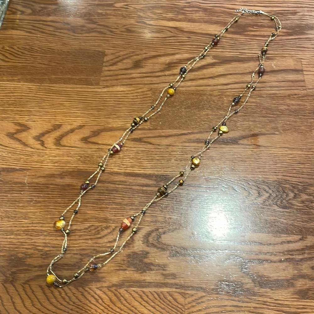 Long golden beaded necklace